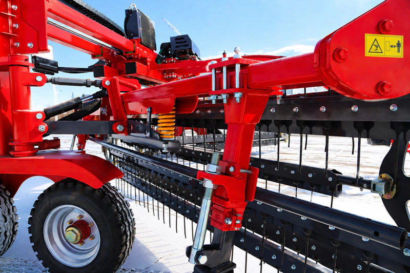 Roller type Hay rake active in the field